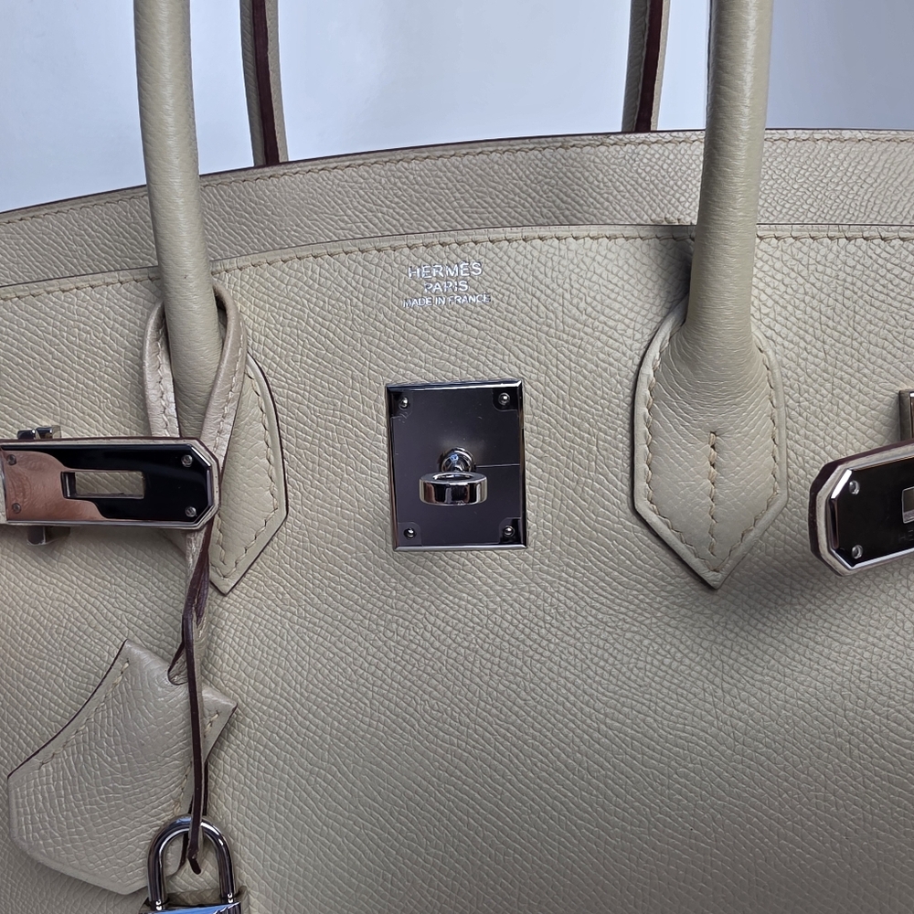 Hermes Cream Satchel with Structured Design and Silver Hardware - Picture 13 of 16
